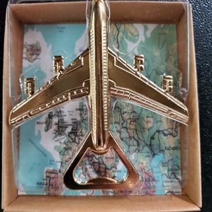 Gold tone metal airplane bottle opener